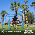 4 Square in the Air Home Edition with compact storage and adjustable heights. People playing on green grass with a blue sky and palm trees in the background 