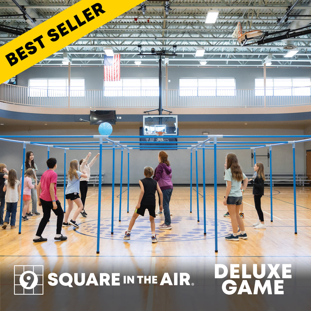 Best selling 9 Square in the Air Deluxe Game Set with adjustable height features and outdoor compatibility. Students having fun playing game in a gymnasium. 