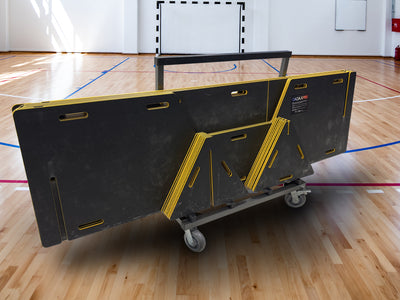 Black GagaXP cart used for transporting gaga pit. Shown with pit components loaded on it in a gymnasium. 