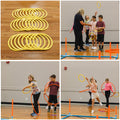 Yellow plastic hoops on a wooden floor. Boys and Girls having fun tossing rings onto orange pipes. 